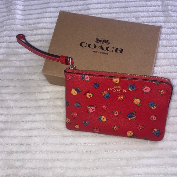 Coach Handbags - Coach Red Wristlet with Colorful Floral Design NWOT